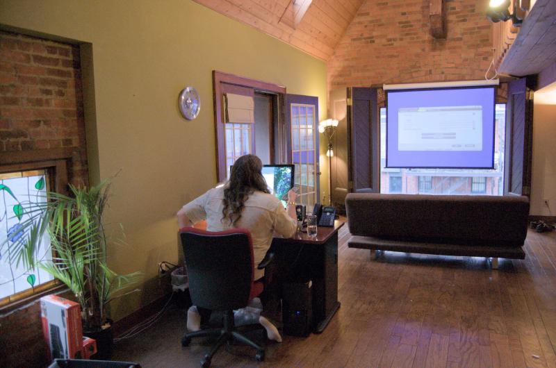 nick setting up projector in willett house