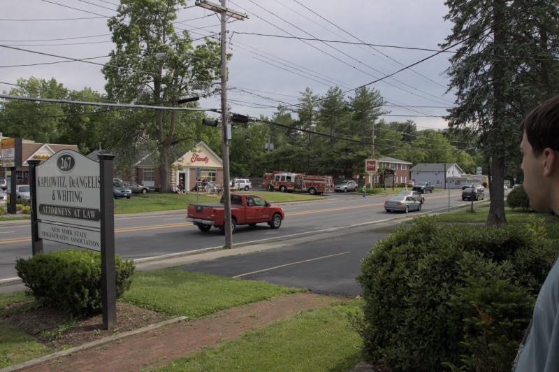 front of delaware ave office looking out to street with Jeff and fire trucks at friendly&rsquo;s resturant